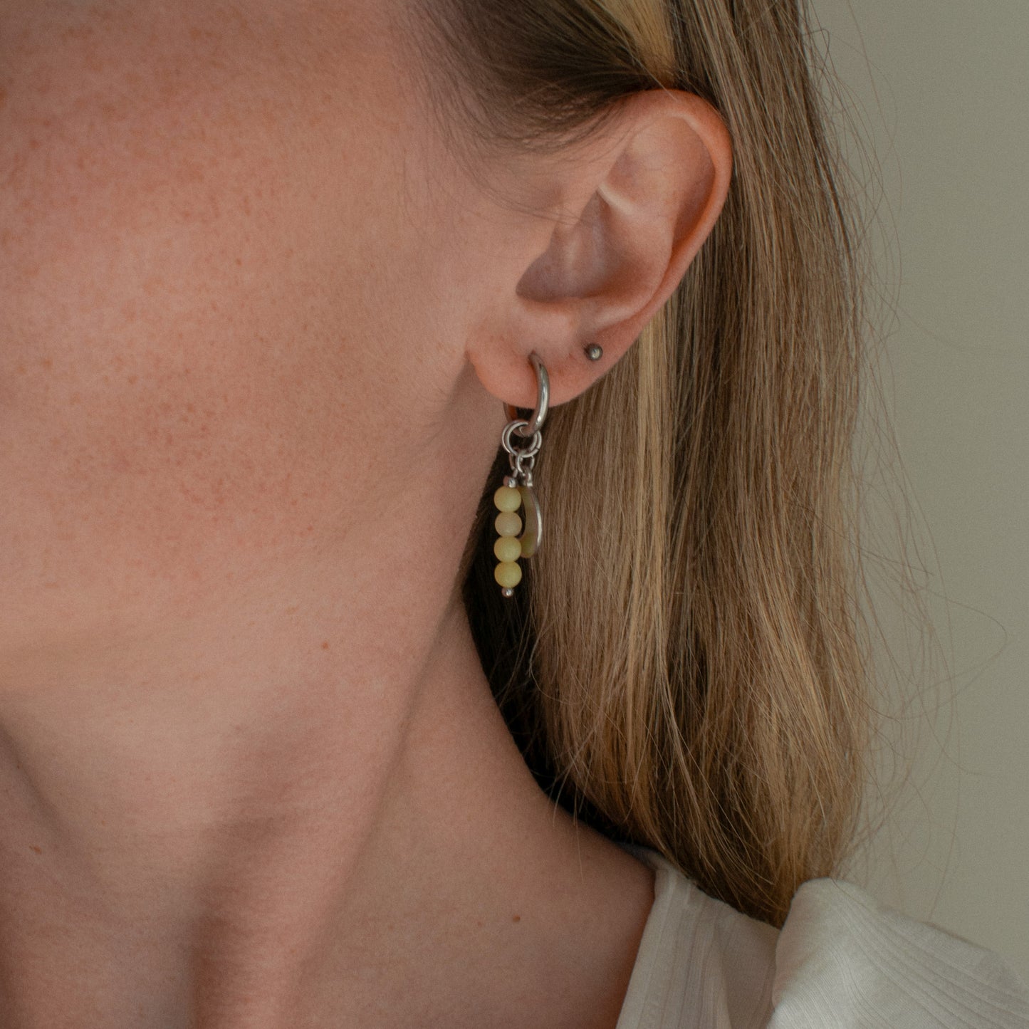 Otava - Asymmetric North Star Earrings with Yellow Beads