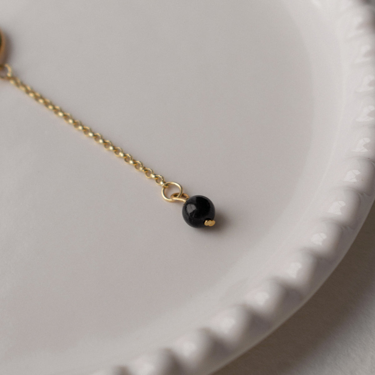 Varje - Black Donut Asymmetric Hoops